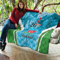Blue quilt held outdoors with green-white stripes, “20 Yanvar 1990”, Azerbaijan map, Your Text