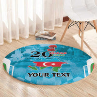 Round blue rug with map artwork, “YANVAR 1990” text, and “YOUR TEXT”