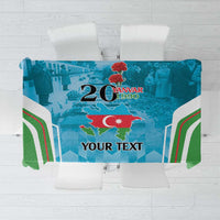 Personalized blue tablecloth with green accents, map and red emblem print