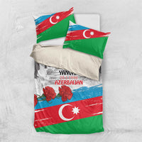 Flag-style duvet with green-red-blue border, crescent star, and two folded pillowcases