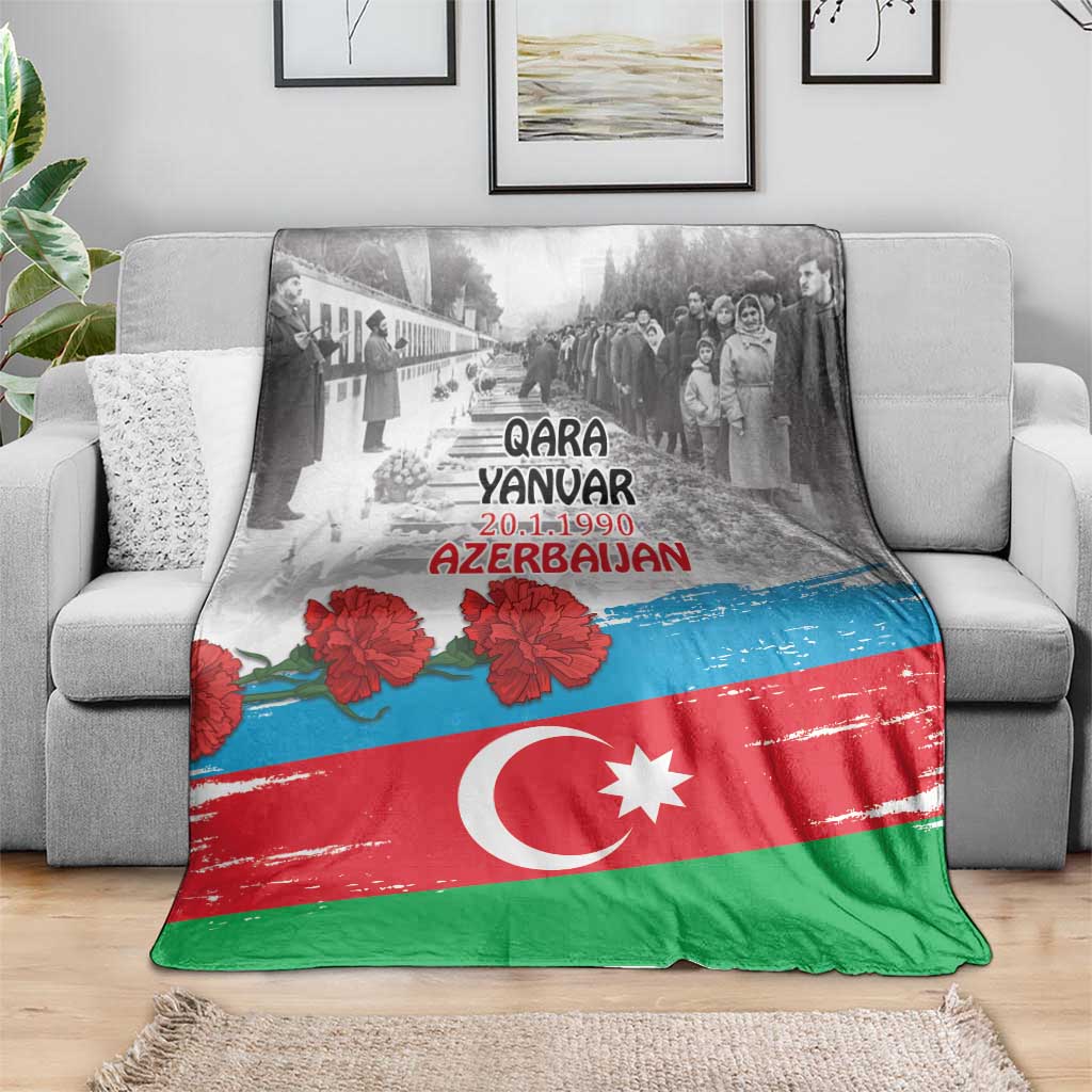 Azerbaijan flag style blanket on couch, red green blue with Qara Yanar Azerbaijan lettering