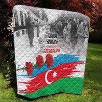 Quilt showing flag-style colors: red, green, blue stripe, crescent and star with red flowers