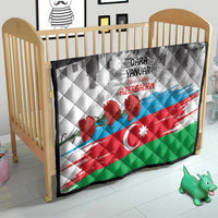 Flag-style quilt on baby crib, gray graphic top, red flowers, crescent and star design