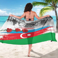 Flag-style sarong draped over shoulders, gray scene with red and green stripes, crescent