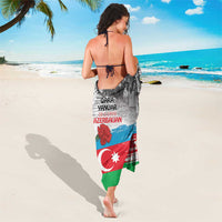 Azerbaijan flag sarong with gray text, red/green diagonal stripes, and flower accents