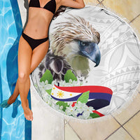 White round beach blanket featuring eagle artwork, flag colors, and tassel fringe