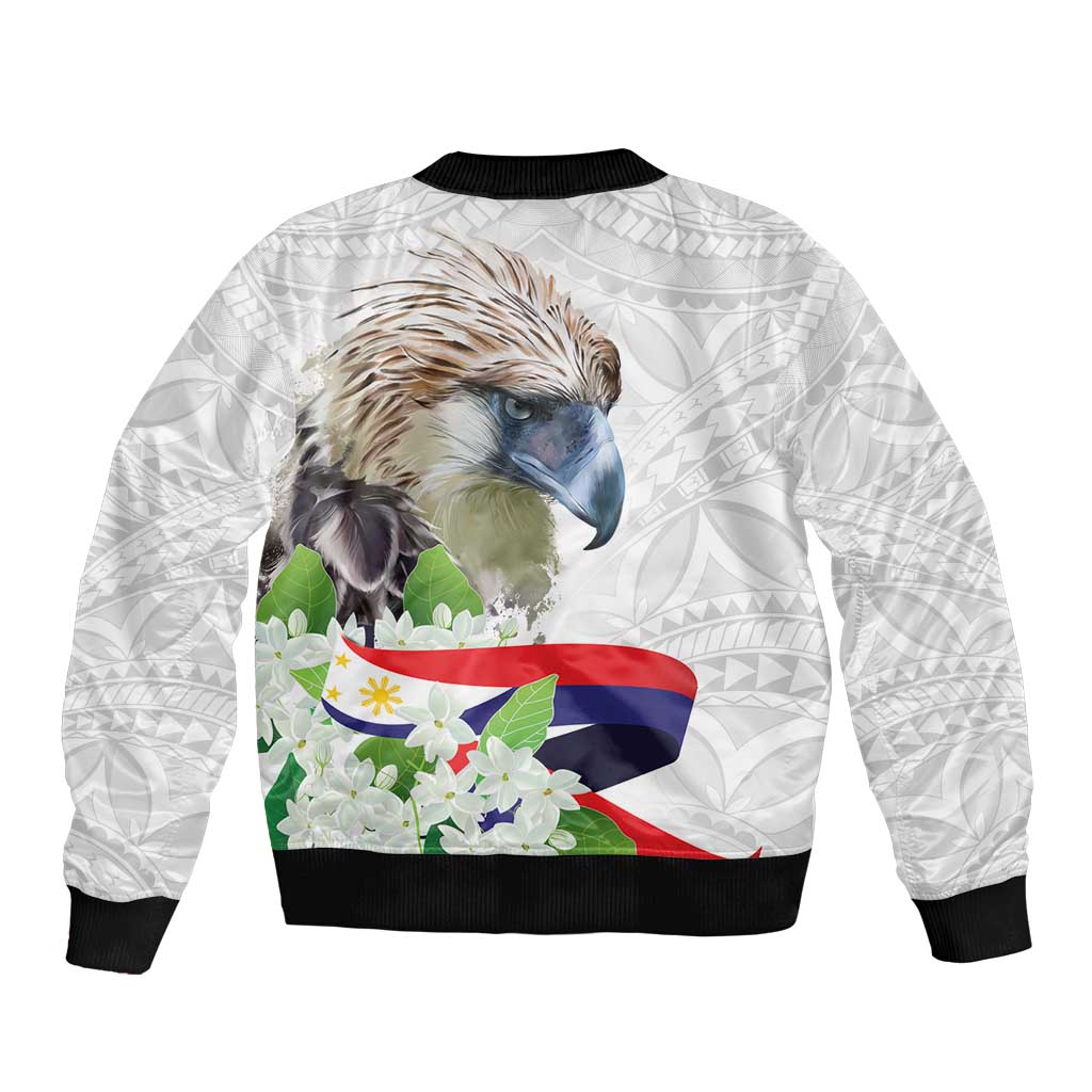 White bomber jacket back with black rib trim, eagle head, floral corner, flag print