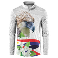 White quarter-zip sweatshirt with eagle head, rainbow floral banner, and patterned sleeves