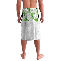 White lavalava shorts with green leaf print and geometric pattern, back view