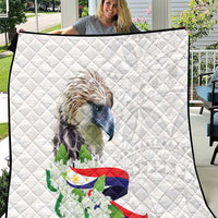 White quilt with diamond stitching, featuring a detailed eagle, flag, and sampaguita flowers.