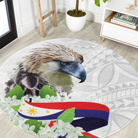 Round area rug with eagle face, sampaguita flowers, and white geometric Polynesian pattern