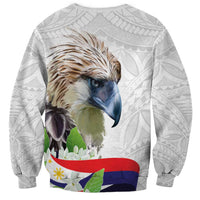 Unisex light gray sweatshirt with eagle front print and Polynesian pattern on sleeves