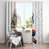 White window curtains with eagle, sampaguita blossoms, and flag motif on both panels