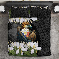 Black bedding set with eagle crest, geometric pattern, and white jasmine flowers