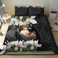 Black bedding set with eagle crest artwork, white flowers, and geometric diamond pattern