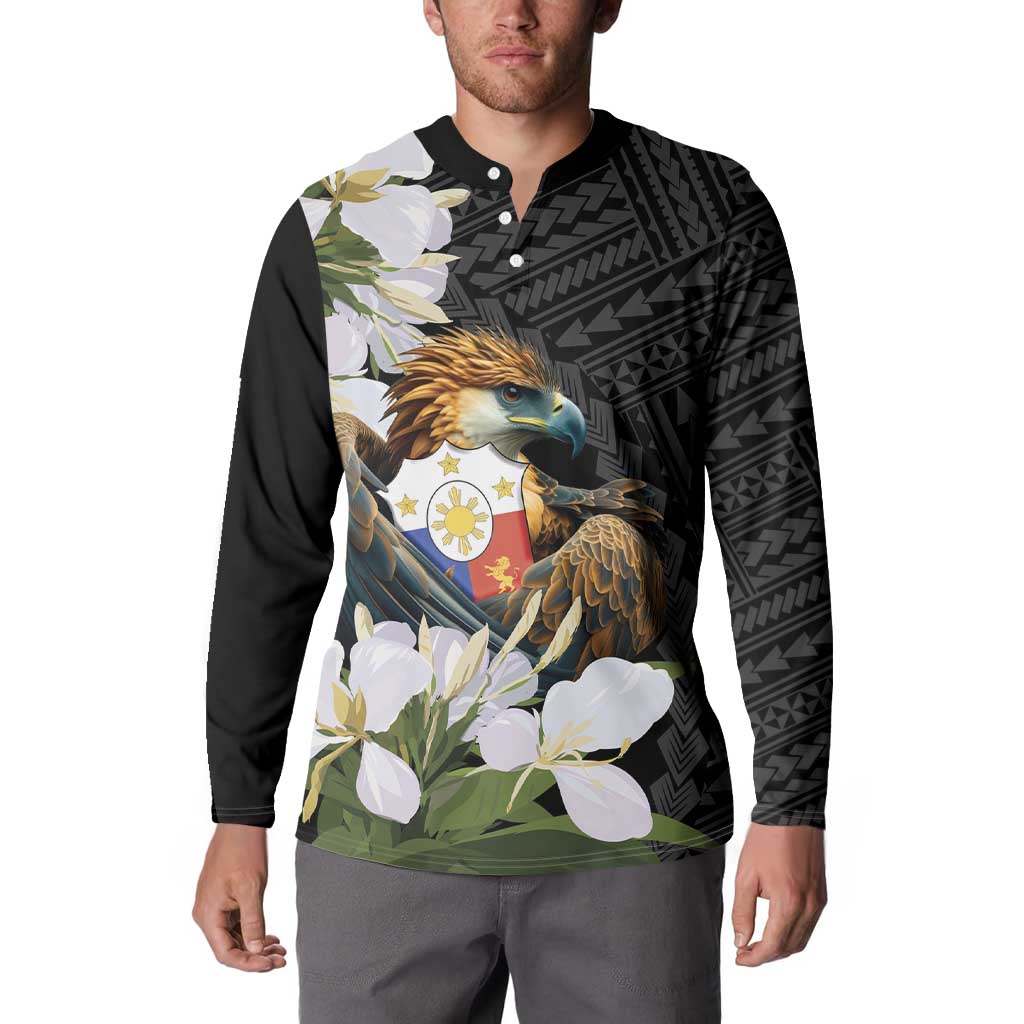 Black long-sleeve button sweatshirt worn front, showing eagle crest and white sampaguita flowers