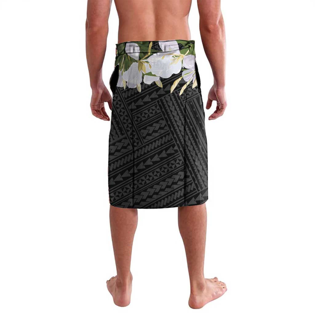 Black knee-length sarong-style skirt with geometric pattern and white floral trim