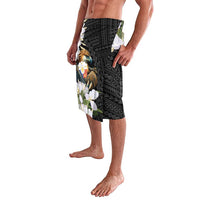 Black knee-length sarong-style skirt with eagle crest and white flowers, side view
