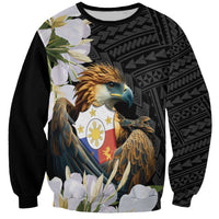 Unisex black crewneck sweatshirt with eagle-and-coat-of-arms graphic and sampaguita flowers