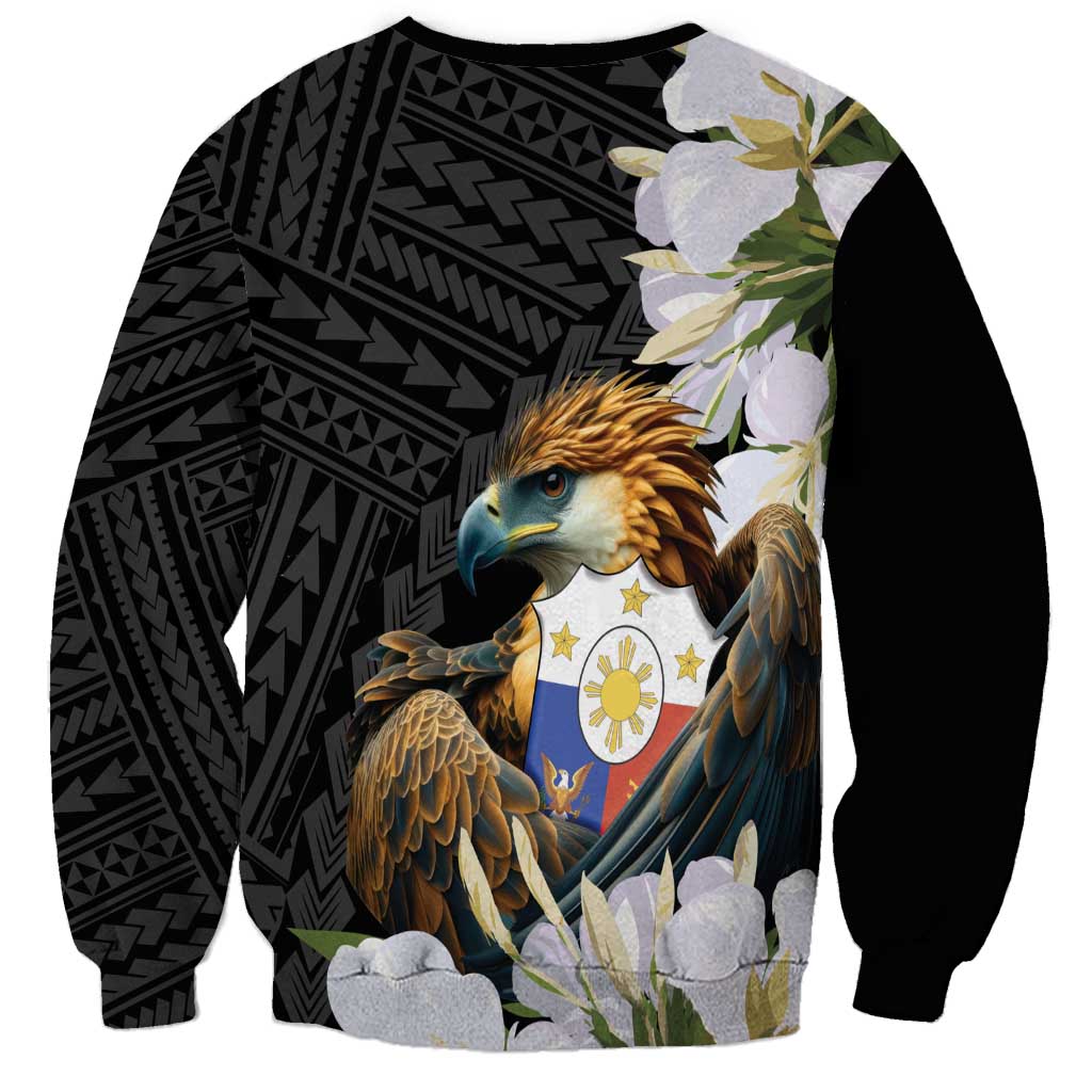 Unisex black crewneck sweatshirt with large eagle graphic, coat-of-arms shield, and floral accents