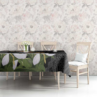 Black tablecloth with eagle coat of arms, geometric design, and green leaf sampaguita flowers