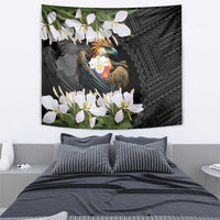 Black eagle tapestry wall hanging, white blossoms and teal-gold crest in center