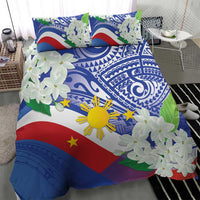 Philippines flag bedding set with blue swirls, red diagonal stripe, and white jasmine blossoms