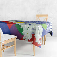 Philippines flag tablecloth with colorful geometric shapes, blue border, and jasmine flowers.