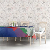 Philippines flag tablecloth on dining table, blue tribal pattern with jasmine flower accents.