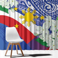 Flag-themed curtain fabric close-up with blue tribal waves, yellow sun, and white jasmine