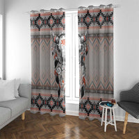 Gray window curtain panels with buffalo skull print and red-and-black tribal stripes