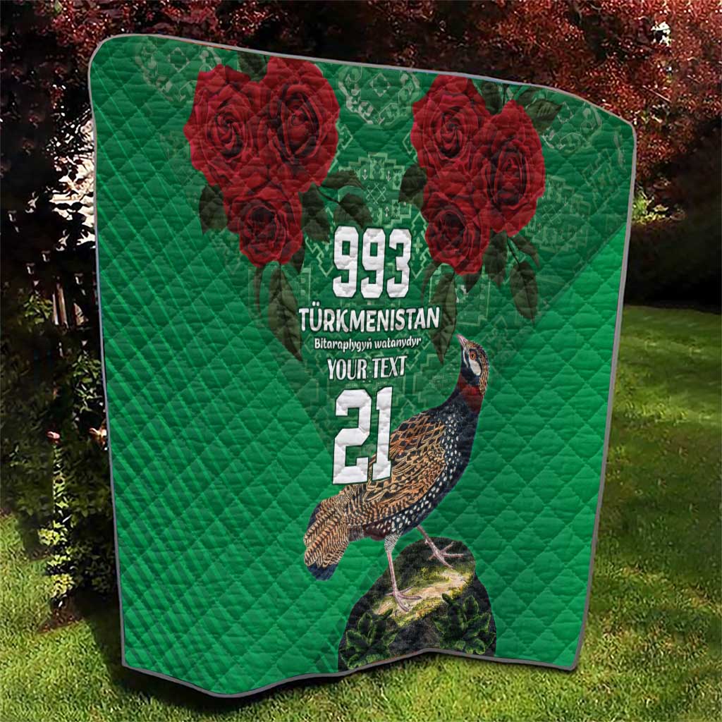 Green quilt with red roses, bird artwork, 993 Turkmenistan and number 21.