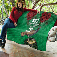 Green quilt held outdoors, red roses and bird design with 993 Turkmenistan and 21.