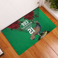 Green rubber doormat with bird and roses, 993 and 21 centered