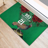 Green rubber doormat featuring bird artwork with 993 and 21 numbers
