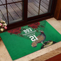 Green rubber doormat with bird, red roses, and 993/21 design