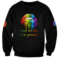 Black unisex sweatshirt with pride lips graphic and slogan 'never too late to be yourself'
