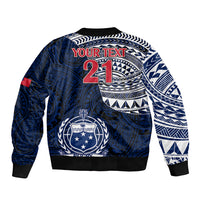 Blue bomber jacket back print with YOUR TEXT 21 and white tribal graphics, ribbed hem