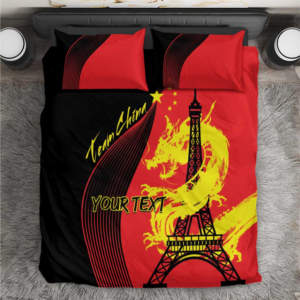 Red/black bedding set with dragon and Eiffel Tower graphic, 'YOUR TEXT' on comforter