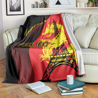 Red, black and yellow personalized blanket with Eiffel Tower, dragon and star graphic