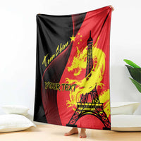 Folding throw blanket showing Eiffel Tower, dragon flame graphic and 'Your Text' area
