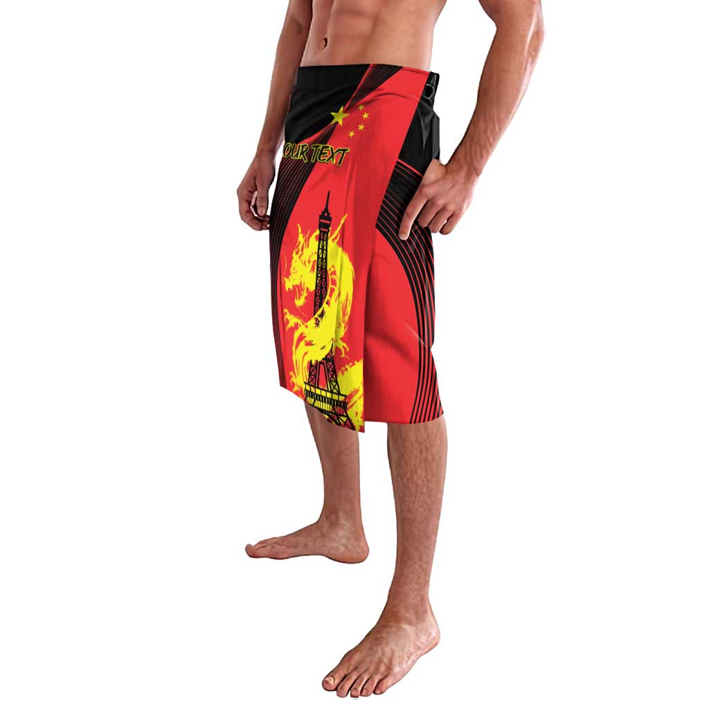 Red and black swim shorts with dragon and Eiffel Tower graphic on side panel
