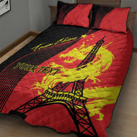 Red quilt with black diagonal stripes and Eiffel Tower silhouette, two pillow shams