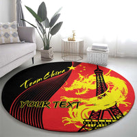 Round red area rug with yellow dragon graphic, Eiffel Tower and Team China text