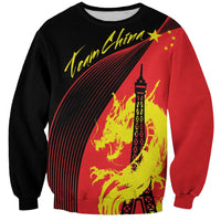Unisex crewneck sweatshirt with red/black dragon and Eiffel Tower front graphic