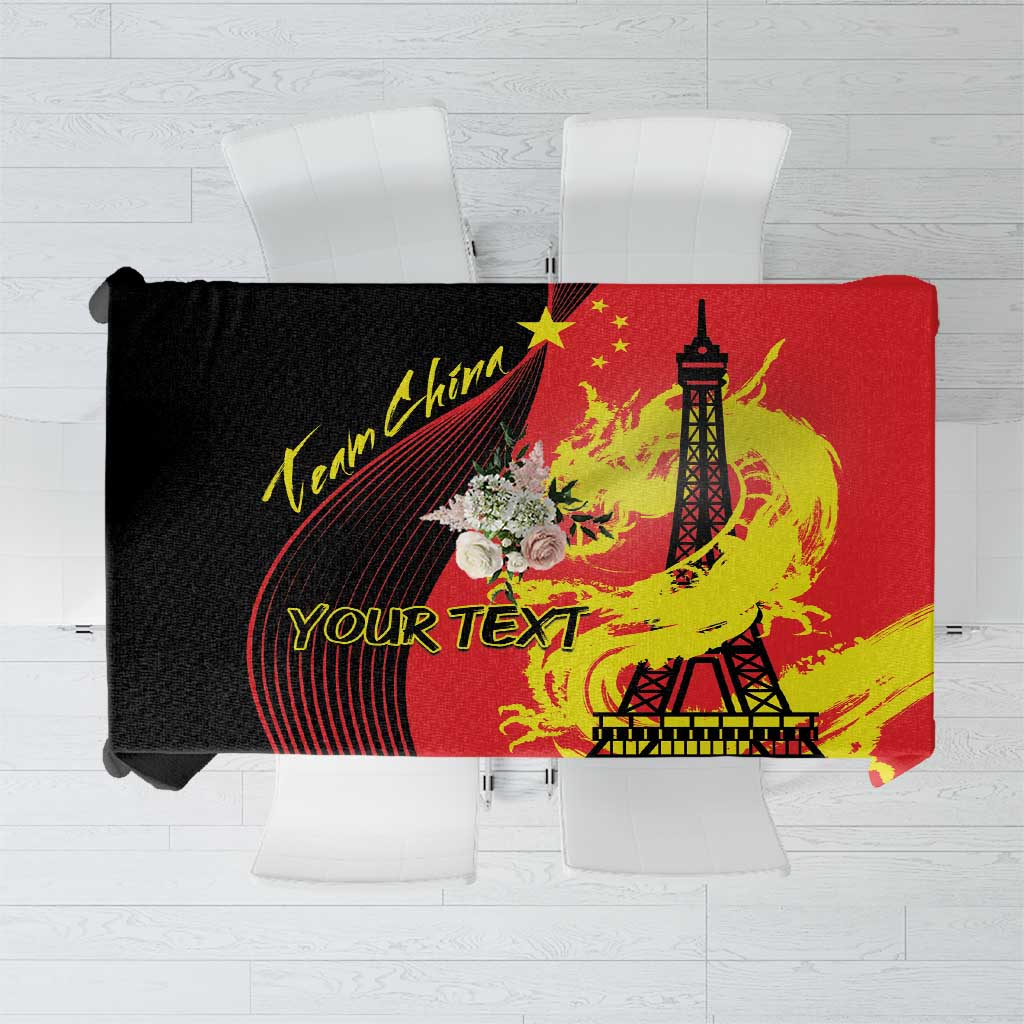Personalized red tablecloth with black Eiffel Tower and yellow dragon graphic, custom text area