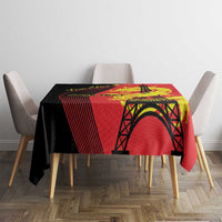 Rectangular red tablecloth with black Eiffel Tower arch and yellow dragon design