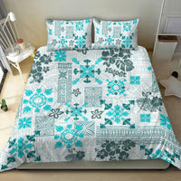 Aqua-and-white tribal patterned duvet set with pillow shams, full-bed shot