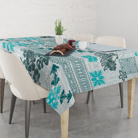 Square aqua tablecloth with teal leaf and tapa quilt patchwork pattern