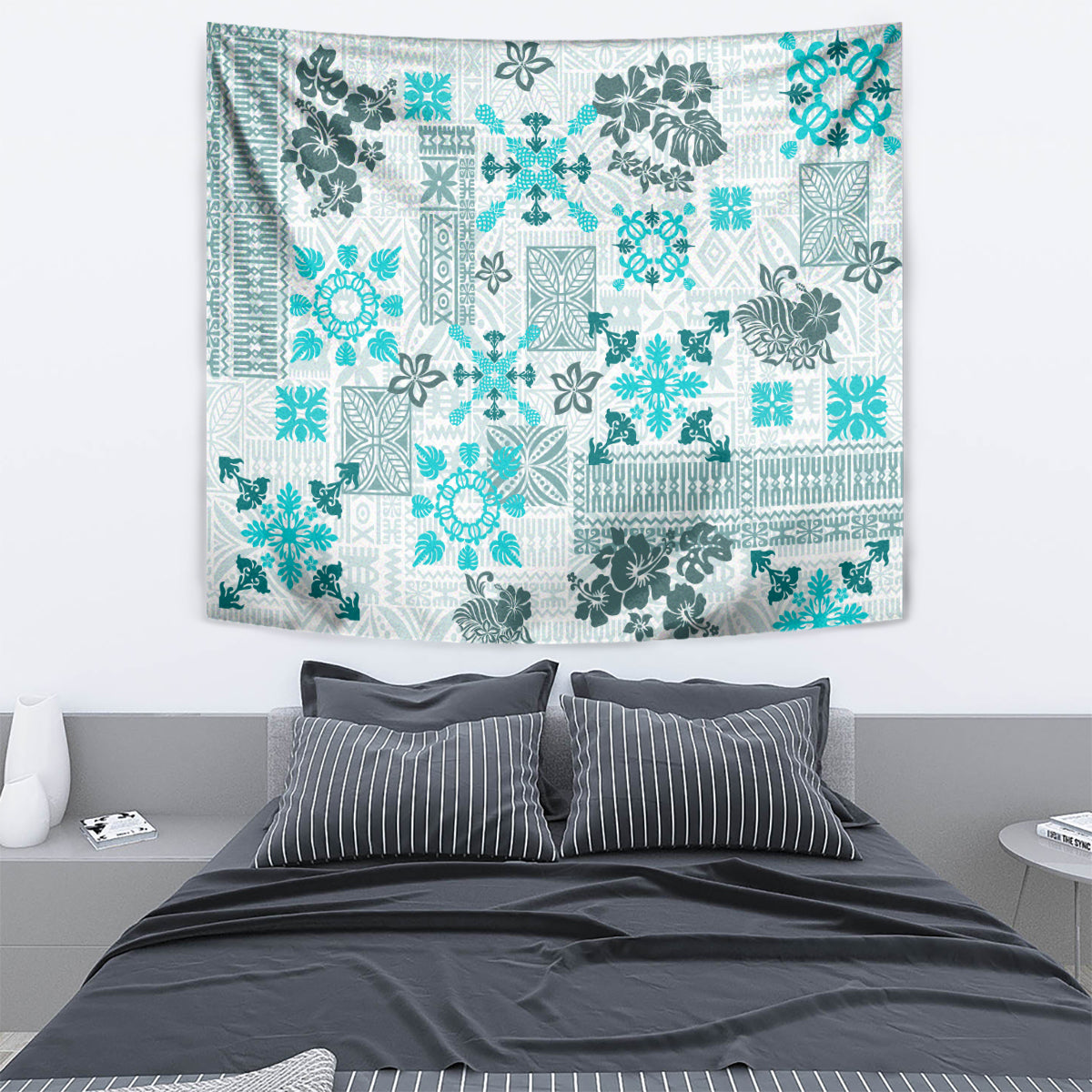 Aqua and white quilt-style tribal tapestry with floral and geometric patchwork motif